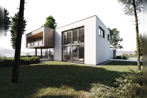 Moderní architektura stále více propojuje interiér s exteriérem skrze zvětšující se prosklené plochy