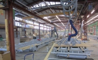 V Plané nad Lužnicí tak v průběhu října 2011 až dubna 2012 vyrostla zcela nová skladovací hala s integrovaným přířezem plošného materiálu.