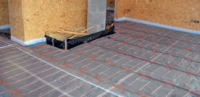 Podlahové kabelové rohože Ecofloor® jsou položeny pod anhydritovou nosnou desku (FENIX).