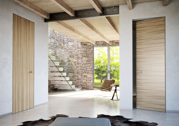 Dveře z řady MASTER DOOR mohou nést na svém povrchu díky moderní hliníkové konstrukci různé materiály, a to včetně dýhy. V kombinaci se skrytou zárubní AKTIVE tvoří výrazný a dokonalý designový prvek interiéru (J.A.P.)