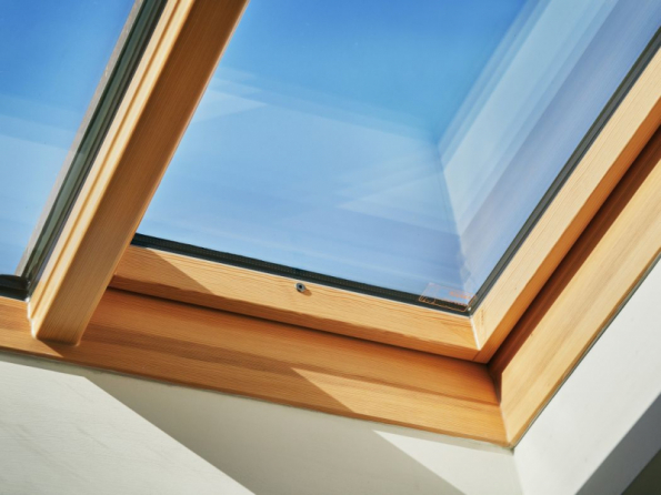 Prosvětlení a ventilace střešních prostor v domě Franze Kafky v Praze